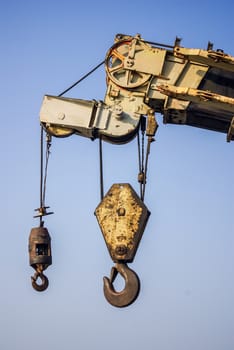 Big crane with blue sky background