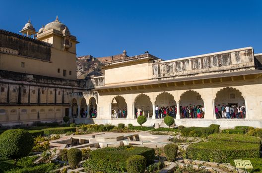 Jaipur, India - December 29, 2014: Tourist visit Sukh Niwas the Third Courtyard in Amber Fort in Jaipur, Rajasthan, India on December 29, 2014. The third courtyard is where the private quarters of the Maharaja, his family and attendants were built.