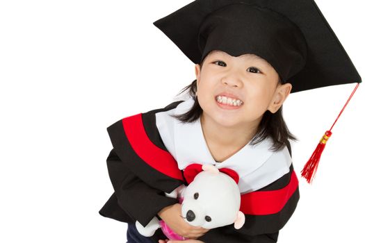 Chinese little girl graduation in white backround studio shot.