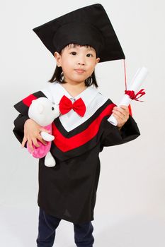 Chinese little girl graduation in white backround studio shot.