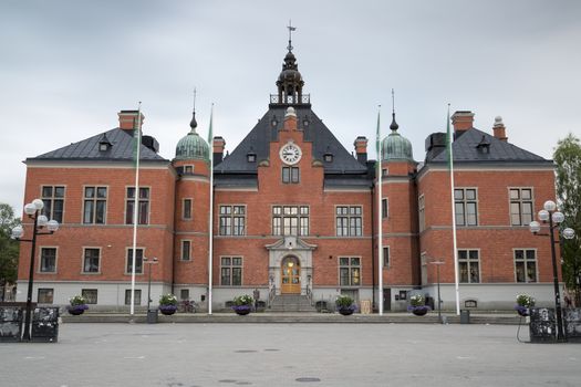 The Town House in Umea, Sweden with clouds in the background.