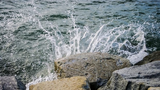 Water splashing at stone