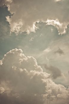 Nice clouds in blue sky in vintage style