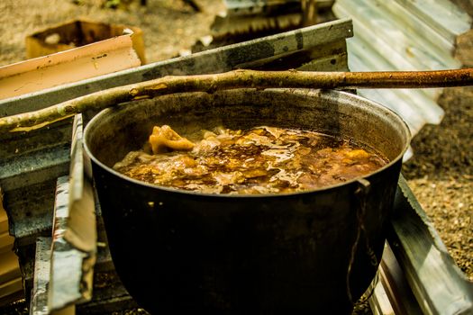 Cooking goulash outdoors. The traditional Georgian cuisine