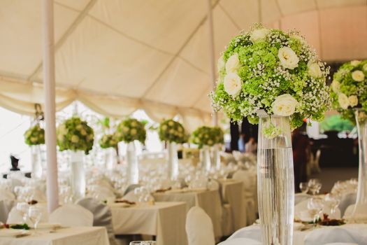 wedding set up in garden inside beach. Closeup of flowers