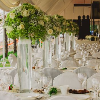 wedding set up in garden inside beach. Closeup of flowers