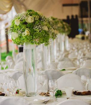 wedding set up in garden inside beach. Closeup of flowers