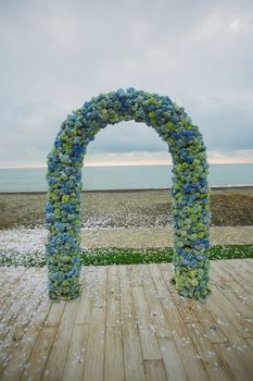 beach wedding set up, outdoor wedding reception, wedding arch