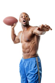 Toned and ripped athletic quarterback throwing a football isolated over a white background.