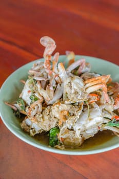 Stir fried Crab with chili & Basil leaves , spicy seafood dish