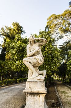 Afraid Woman statue in Villa Giulia at Palermo, Sicily, Italy