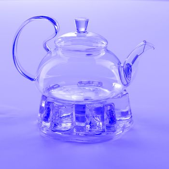 Isolated Tea Pot from glass on the table