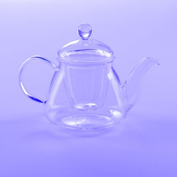 Isolated Tea Pot from glass on the table