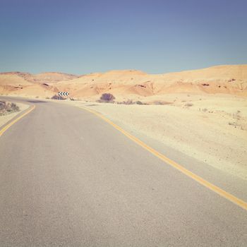 Winding Asphalt Road in the Negev Desert in Israel, Instagram Effect