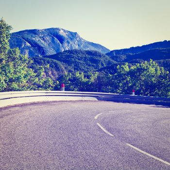 Winding Paved Road in the French Alps, Instagram Effect