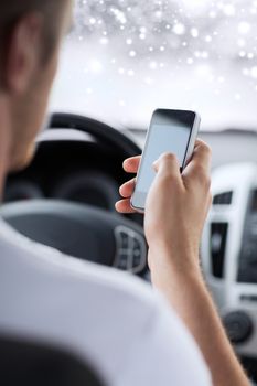 transportation, people, technology and vehicle concept - close up of man using smartphone while driving car