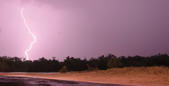 Lightning Strkes over a river in southeast Texas