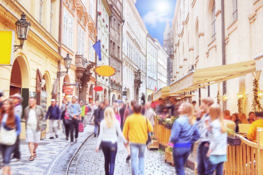 Crowd of people in streets of Prague.