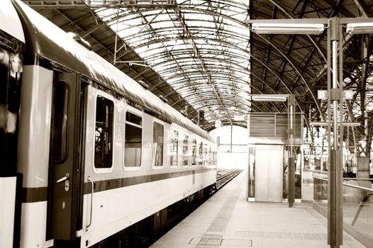 Departure from the train station. Sepia version.