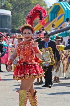 SAO PAULO, BRAZIL August 9 2015: An unidentified girl with typical costume in the Morenada parade in Bolivian Independence Day celebration in Sao Paulo Brazil.