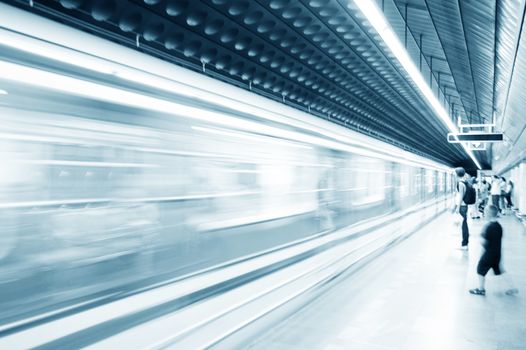 Subway train pulling into the station. Motion blur picture. 