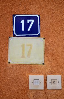 Picture of a Door number 17 on a metalic plate