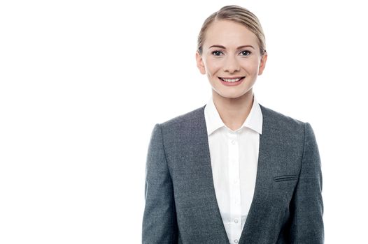 Portrait of a young businesswoman posing over white