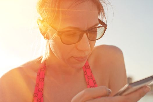 Woman at beach, close up still life portrait