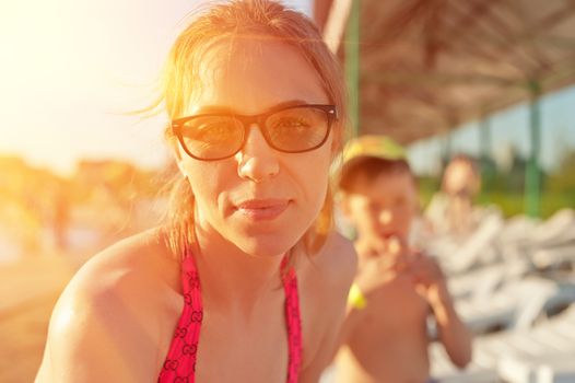 Woman at beach, close up still life portrait