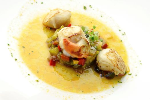 Fish Dish Braised Scallops with Onions and Peppers in Soup in white plate