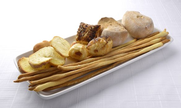 Plate with Assortment of Bread Crostini and Breadsticks