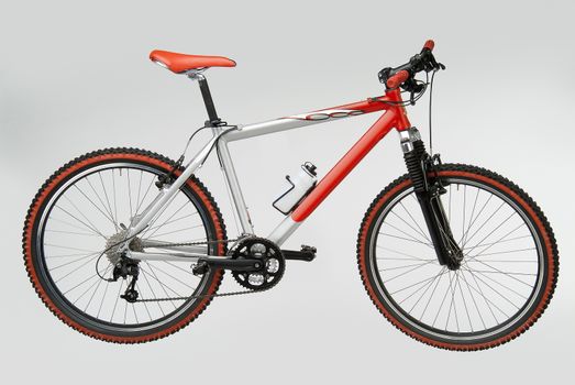 Silver and Red Mountain Bike on white background
