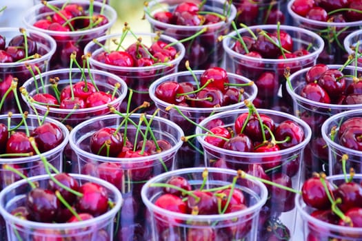 Cherries in clear plastic cups
