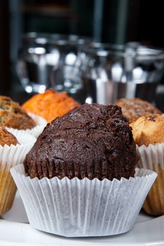 Different kinds of muffins on the kitchen table