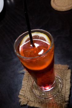 Glass with cocktail on the kitchen table