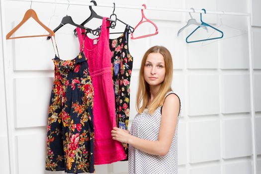 young woman in a fashion showroom. horizontal