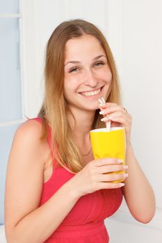 young woman posing hold water glass. Beautiful girl portrait