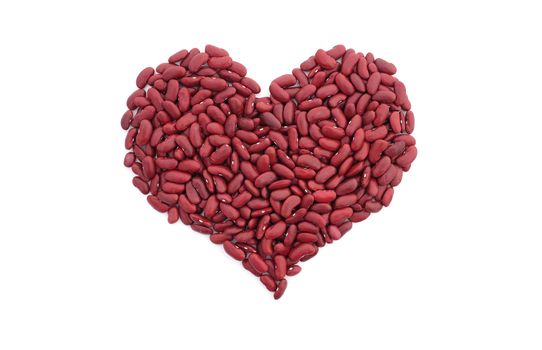 Red kidney beans in a heart shape, isolated on a white background