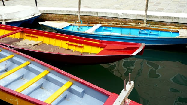 colorful boats transportation in Venice Canal, Italy