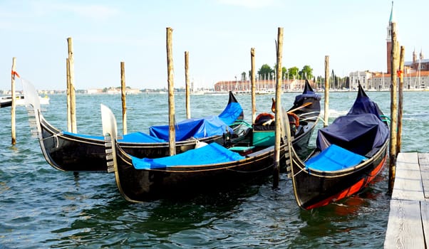 gondola boats floating station in the sea in Venice, Italy