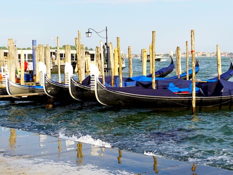 gondola boats station floating in the sea in Venice, Italy