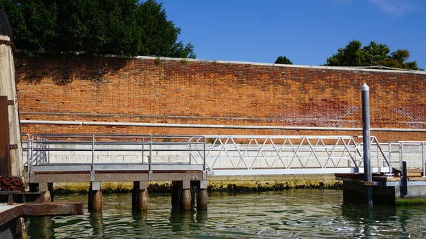 pier and water for boat transportation in Venice, Italy