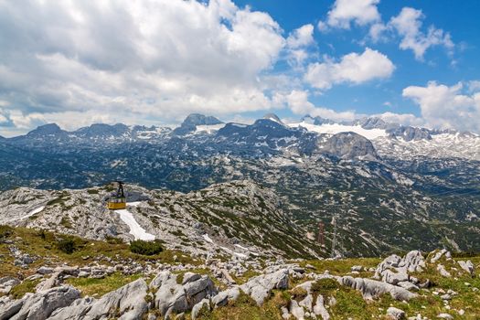 Obertraun, Austria - June 27, 2014: On top of Dachstein mountains, a famous tourist destination of Salzburger Land for hikers.