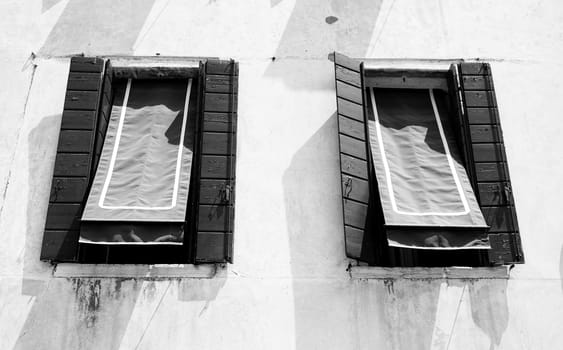 black and white two windows in Venice, Italy