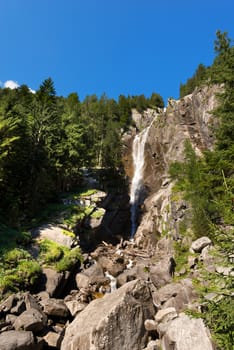 Waterfall in summer Regina del Lago (Queen of the lake). Daone valley Trentino Alto Adige, Italy