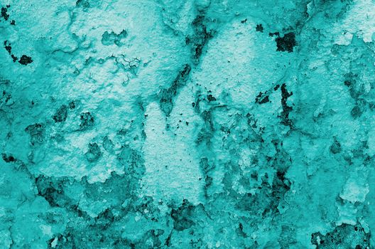 Turquoise Crannied Obsolete Cement Wall Background closeup