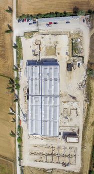 Aerial view of construction site. Overhead spectacular bird's eye view from drone.