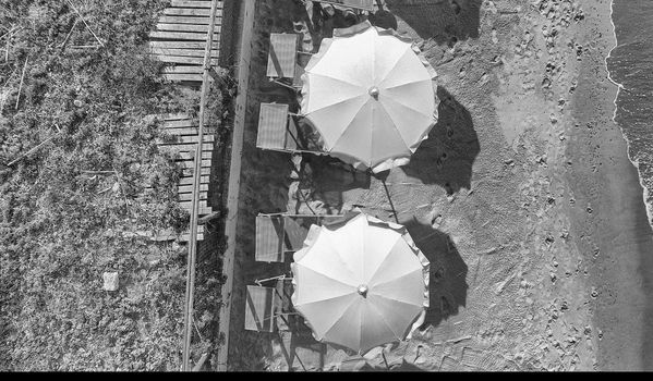 Aerial view of beach umbrellas.