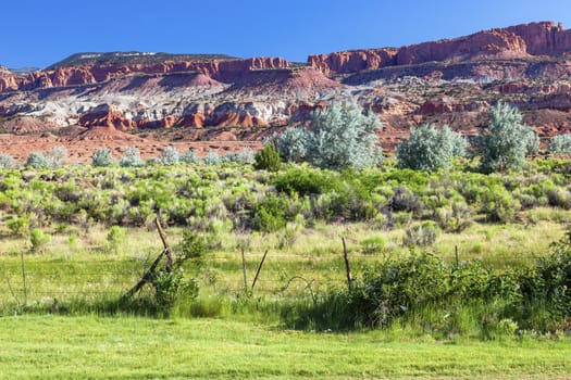 Red Rock Sandstone Mountains Green Grass NearCapitol Reef  National Park Torrey Utah 