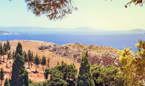 Beautiful summer landscape with sea and mountain views with vegetation. The Island Of Crete, Greece.